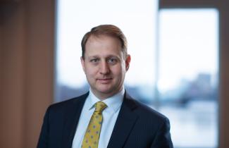 professor Chris Schuh wearing yellow tie.