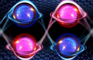 Between layers of graphene are 4 paired, shiny electrons. 2 are blue and 2 are red, and whisps of glowing energy connect them together. They have rings like Saturn, and these rings move them clockwise or counter-clockwise.